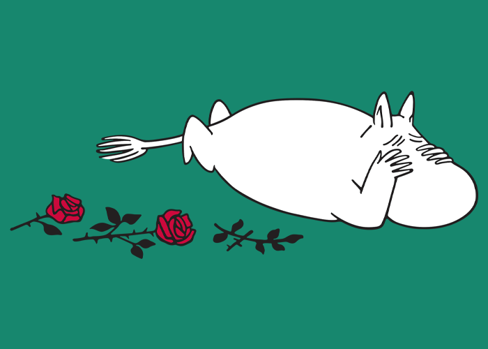 Mummitrollet ligger blant blomster og drømmer