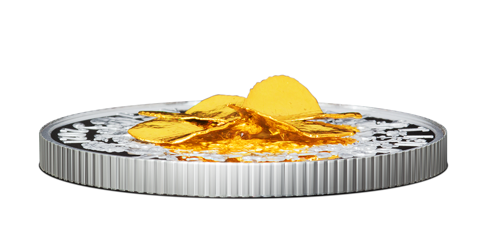 Sølvmynt med en ekte firkløver innlagt i rent gull